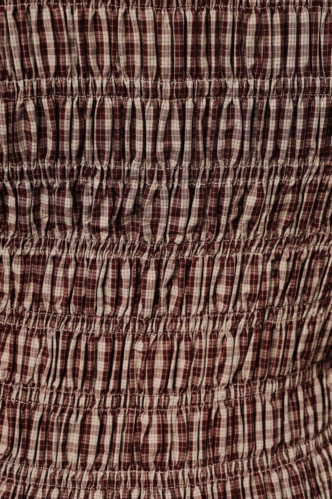 SHORT PUFF SLEEVE SMOCKED PLAID TOP W. RUFFLE DETAIL
